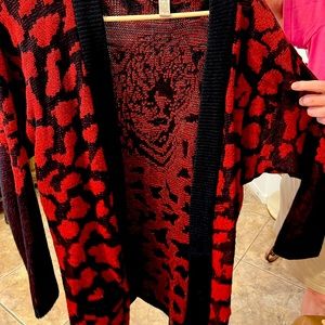 Sweater red/black tiger on back beaded eyes